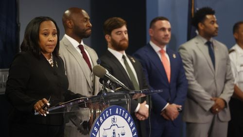 Fulton County District Attorney Fani Willis speaks to the press after after a grand jury handed up an indictment charging former President Trump and 18 others with felonies on Monday, August 14, 2023 in Atlanta. (Michael Blackshire/Michael.blackshire@ajc.com)