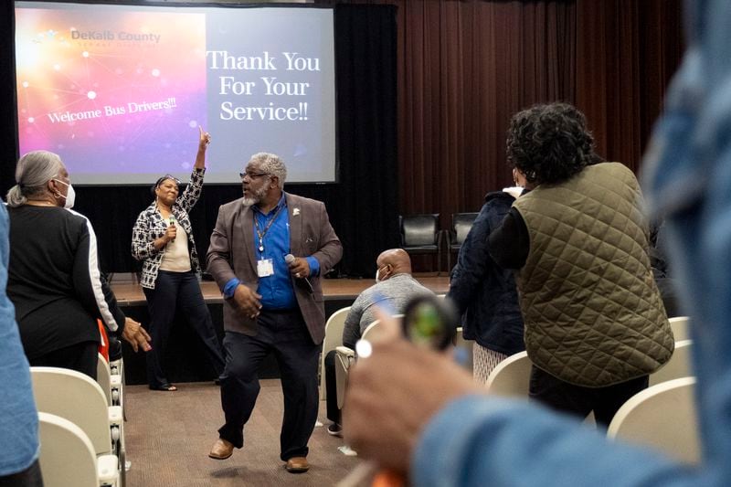 Bernando Brown, director of transportation for the DeKalb County School District, dances and gets the crowd energized during a driver appreciation day for school bus drivers in Stone Mountain on Tuesday, Oct. 10, 2023.   (Ben Gray / Ben@BenGray.com)