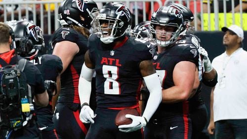 Atlanta Falcons tight end Kyle Pitts (8) reacts after scoring a touchdown during the first half of an NFL football game against the Pittsburgh Steelers on Sunday, Sept. 8, at Mercedes-Benz Stadium in Atlanta. 
(Miguel Martinez/ AJC)