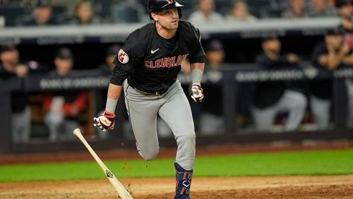 Cleveland Guardians' Lane Thomas looks after and RBI double during the 12th inning of a baseball game against the New York Yankees at Yankee Stadium Tuesday, Aug. 20, 2024, in New York. (AP Photo/Seth Wenig)