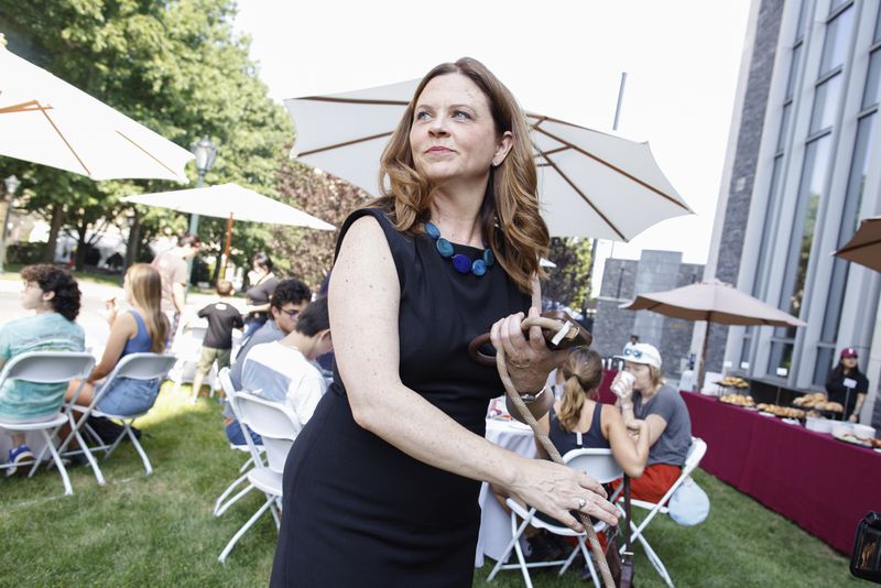 Tania Tetlow, president of Fordham University, meets families from New students during Move In Day at the Bronx campus, Sunday, Aug. 25, 2024, in New York. (AP Photo/Kena Betancur)