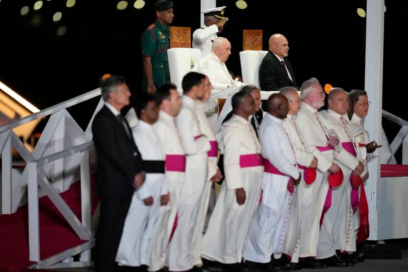 Pope Francis and Papua New Guinea's Deputy Prime Minister John Rosso sit for a welcome of the Pope upon arrival at Jackson's International Airport in Port Moresby, Papua New Guinea, Friday, Sept. 6, 2024. (AP Photo/Mark Baker)