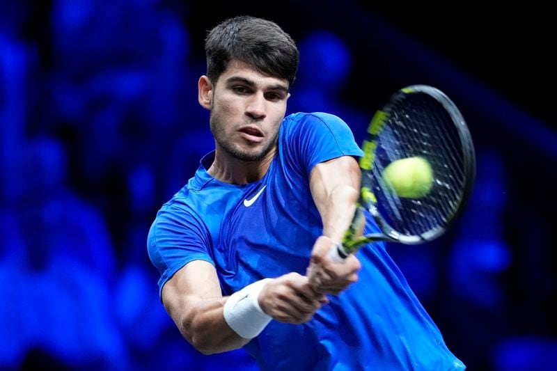 Team Europe's Carlos Alcaraz returns to Team World's Taylor Fritz on the third day of the Laver Cup tennis tournament, at the Uber arena in Berlin, Germany, Sunday, Sept. 22, 2024. (AP Photo/Ebrahim Noroozi)