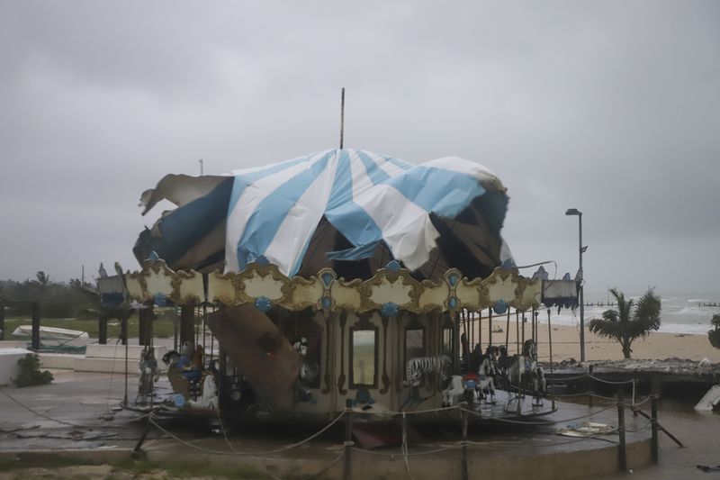 A carousel is damaged after the passing of Hurricane Milton in Progreso, Yucatan state, Mexico, Tuesday, Oct. 8, 2024. (AP Photo/Martin Zetina)