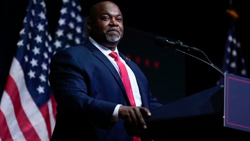 FILE - North Carolina Lt. Gov. Mark Robinson speaks before Republican presidential nominee former President Donald Trump at a campaign rally in Asheville, N.C., Aug. 14, 2024. (AP Photo/Matt Rourke, File)