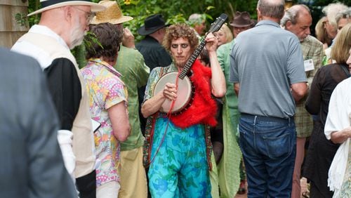 With makeup evoking a Howard Finster-painted face, Majid Araim of Beacon Dance performed live music and movement at Paradise Garden Foundation's 2024 Atlanta Patron Party. Courtesy of Paradise Garden Foundation